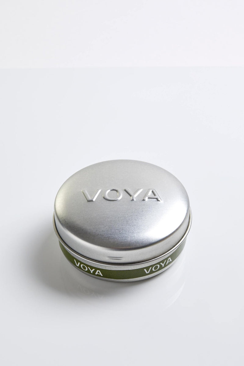voya mini travel candle lime and clove scent in tin packaging
