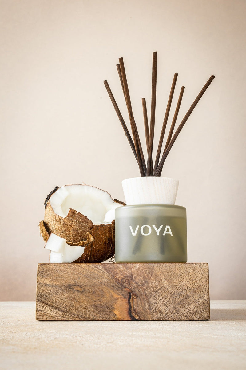 VOYA Skincare USA Coconut and Jasmine Reed Diffuser with a coconut